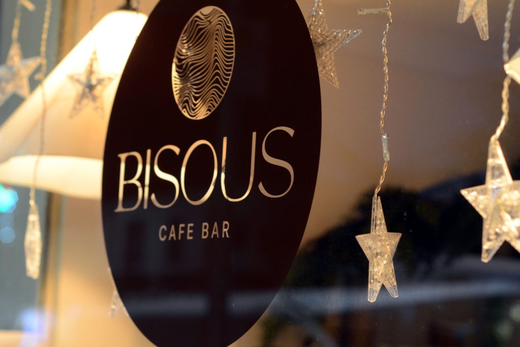 Bisous Cafe Bar window sign