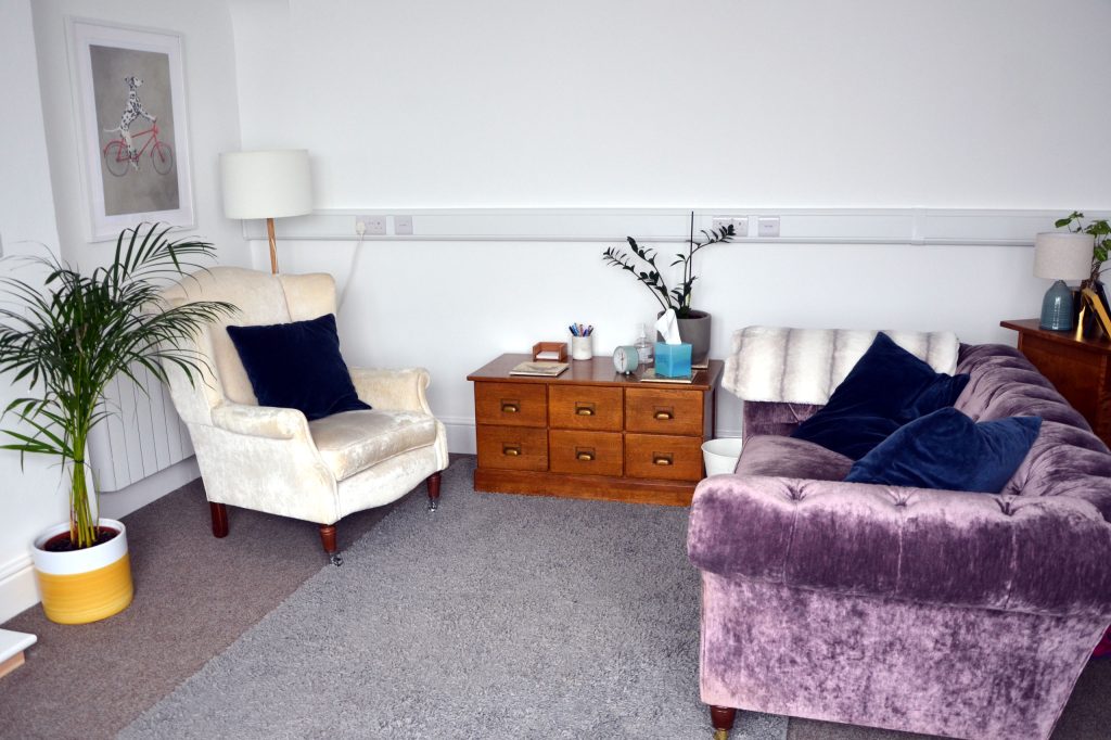 Heart Felt Trauma Therapy room with comfortable chair and sofa